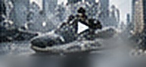 Sneaker hit by a burst of water spray