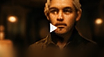 Cinematic portrait of a man in warm lamplight